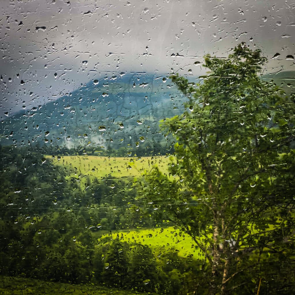 melancholy countryside view seen through an window 2023 11 27 05 06 54 utc