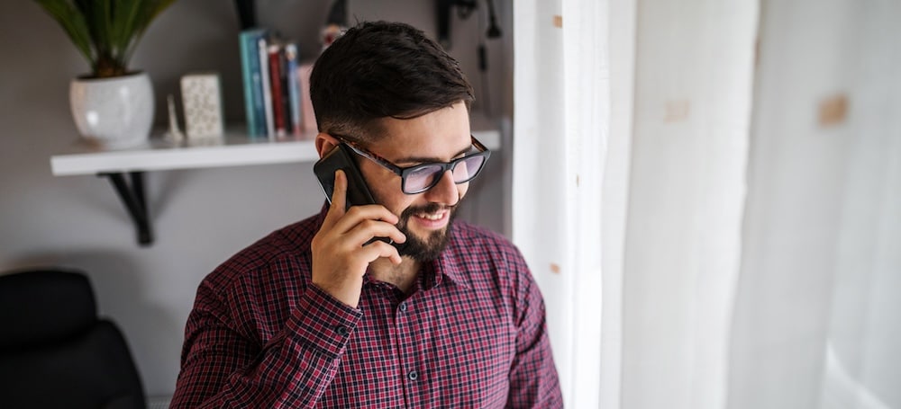 Young professional man making a phone call