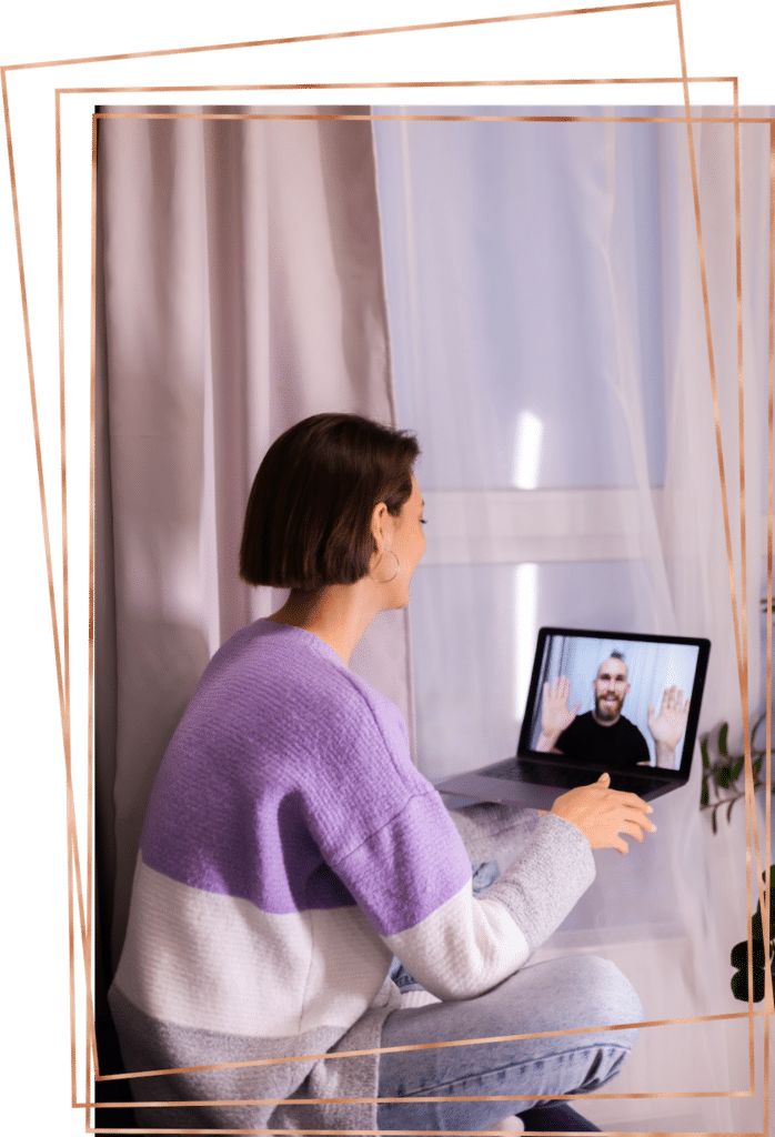 Woman sitting on her laptop with therapist