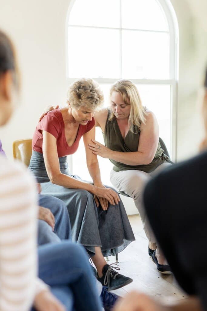 Diverse people in a support group session