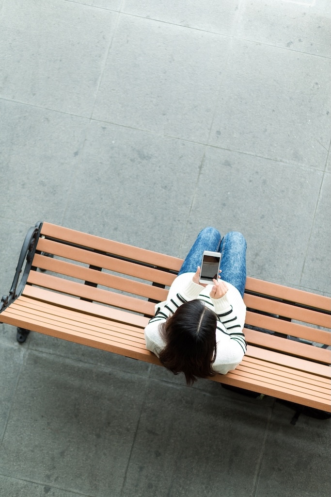 Top view of woman use of cellphone